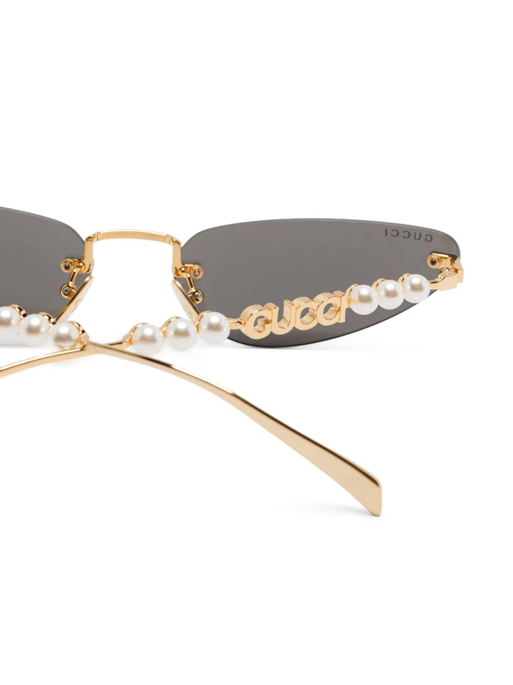 Gucci Eyewear Zonnebril met cat-eye montuur Goud