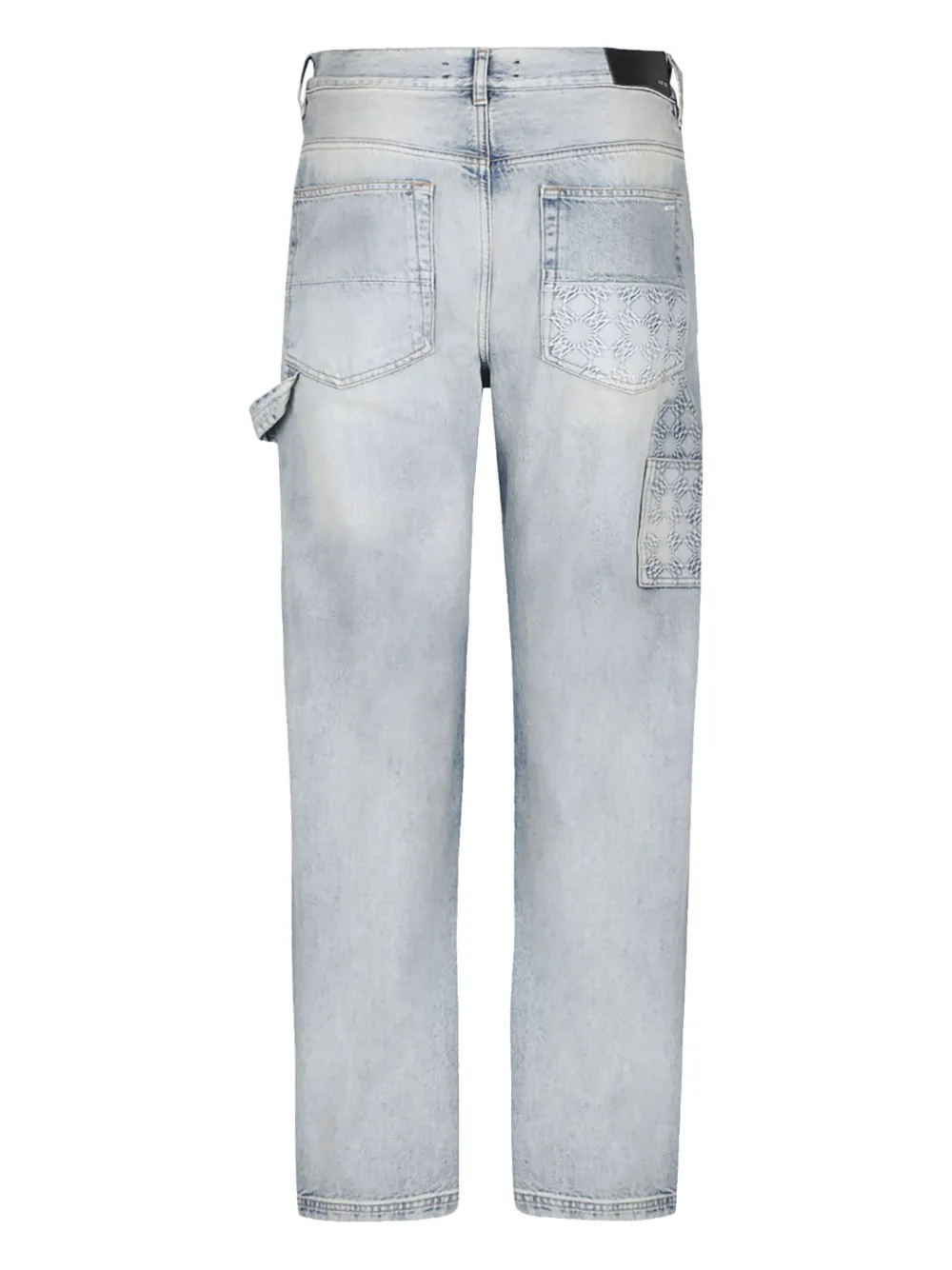 AMIRI monogram-debossed jeans - Blauw