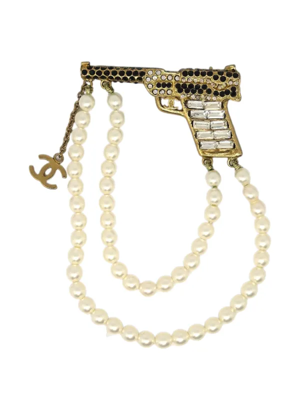 CHANEL Pre-Owned 2001 ガンモチーフ ブローチ | ゴールドトーン