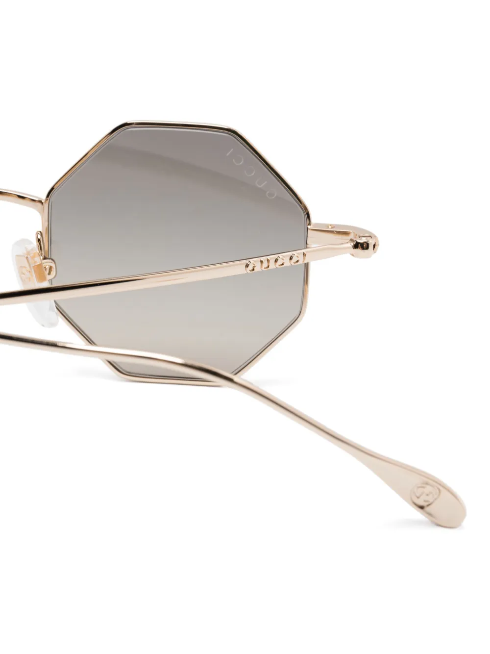 Gucci Eyewear Zonnebril met geometrisch montuur Goud