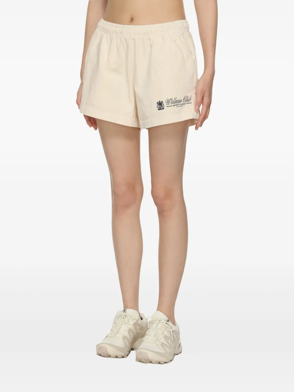 Sporty & Rich Shorts met print Beige