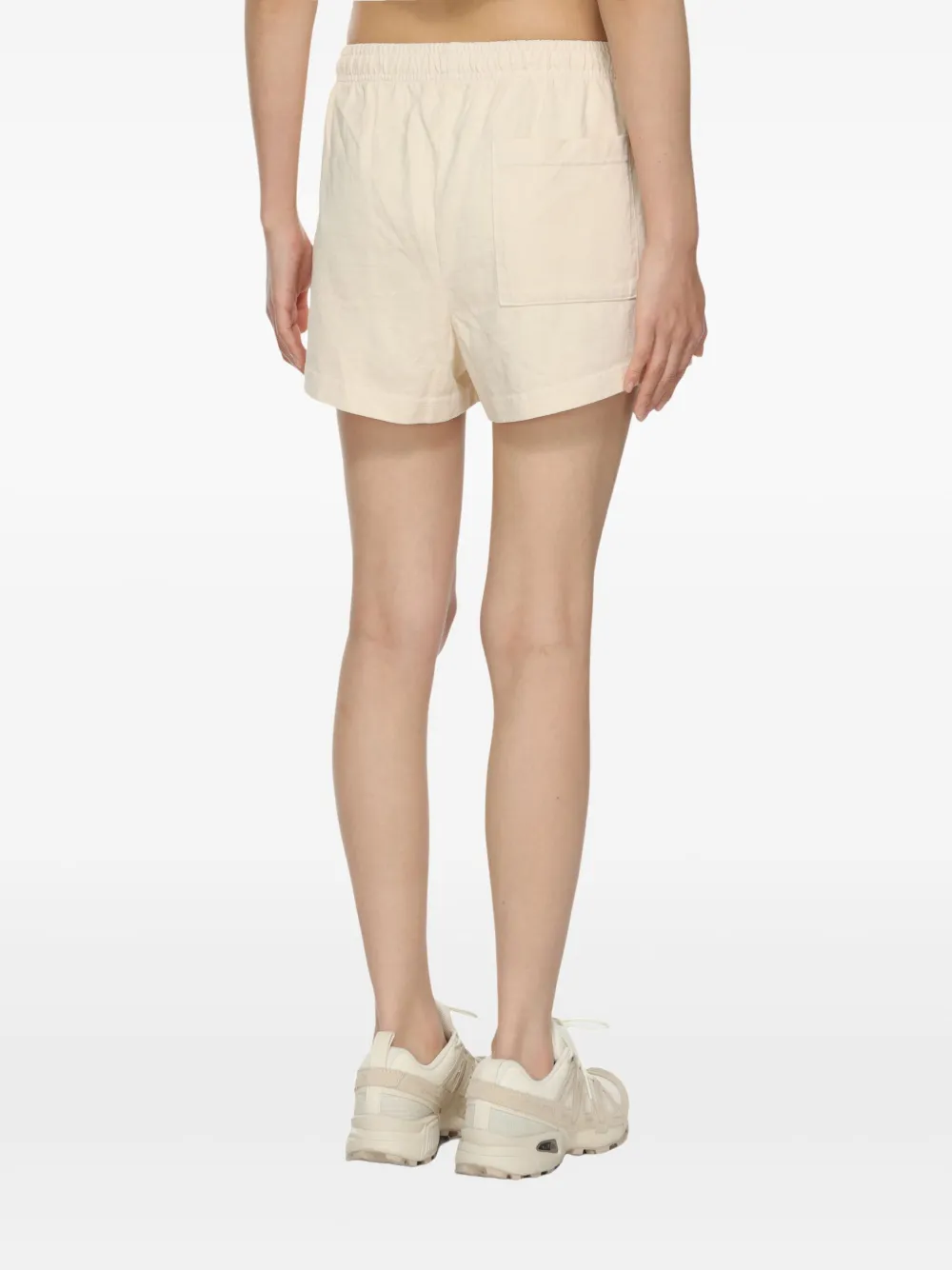 Sporty & Rich Shorts met print Beige