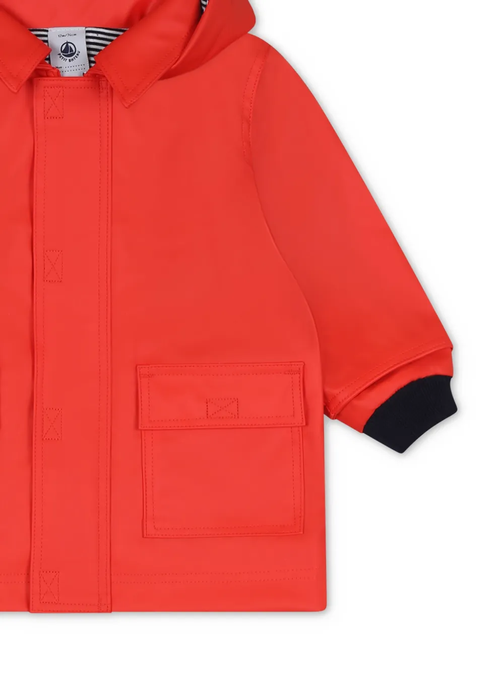 Petit Bateau Waterafstotende regenjas Rood