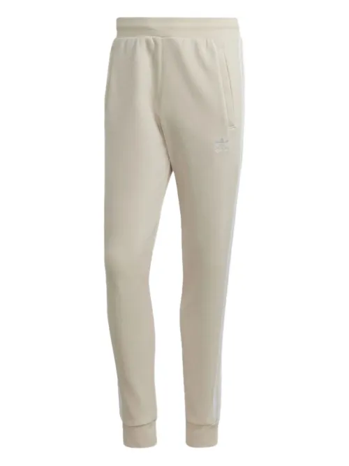 Pantalon de jogging Adicolor Classics à bandes rayées signature - adidas - Modalova