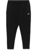 New Balance Tech Knit track pants - Black