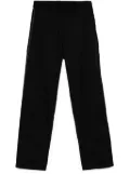 Undercover logo tape-detail trousers - Black