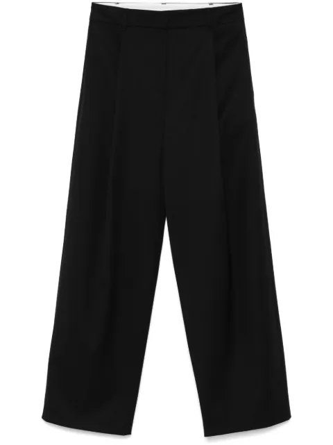 Amomento pantalones plisados
