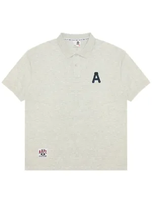 AAPE BY *A BATHING APE® ムーンフェイスロゴ ポロシャツ