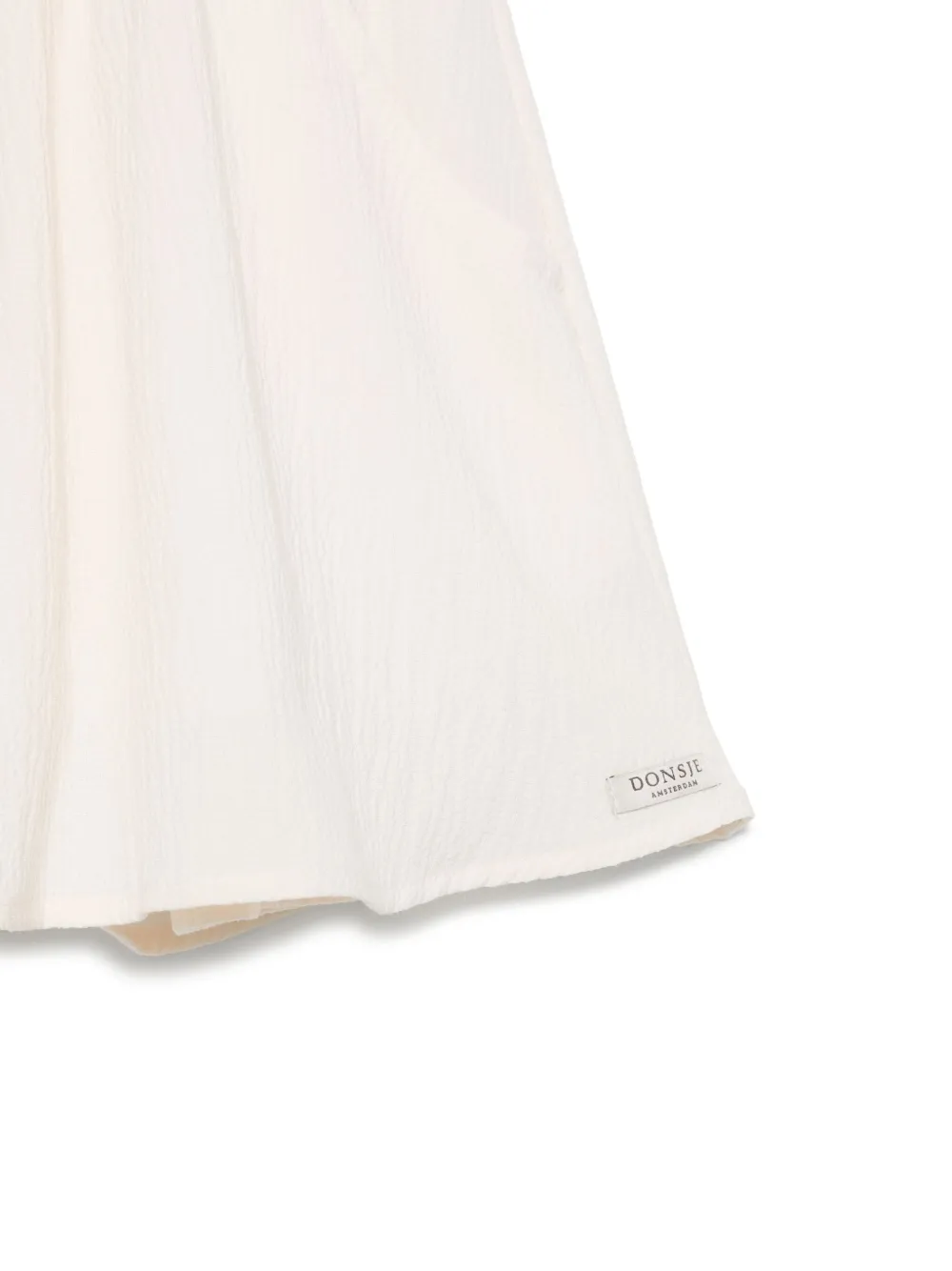 Donsje Gekreukte shorts Beige