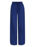 Osklen perforated track pants - Blue