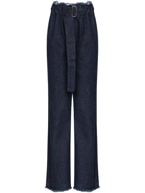 Uma | Raquel Davidowicz jeans con flecos y hebilla