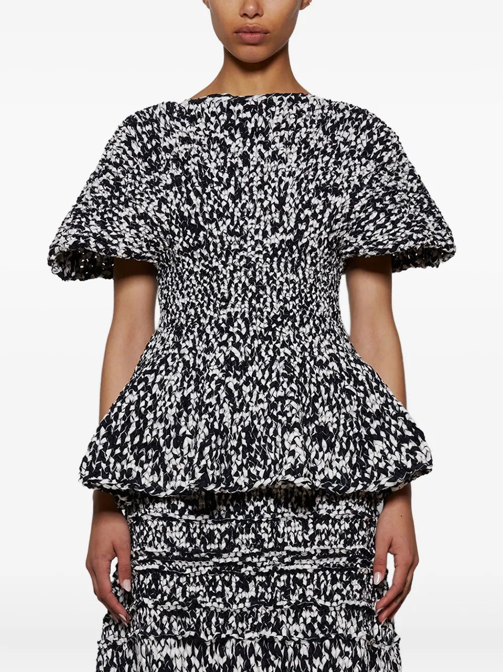 KHAITE Mathilde peplum top met pofmouwen Blauw