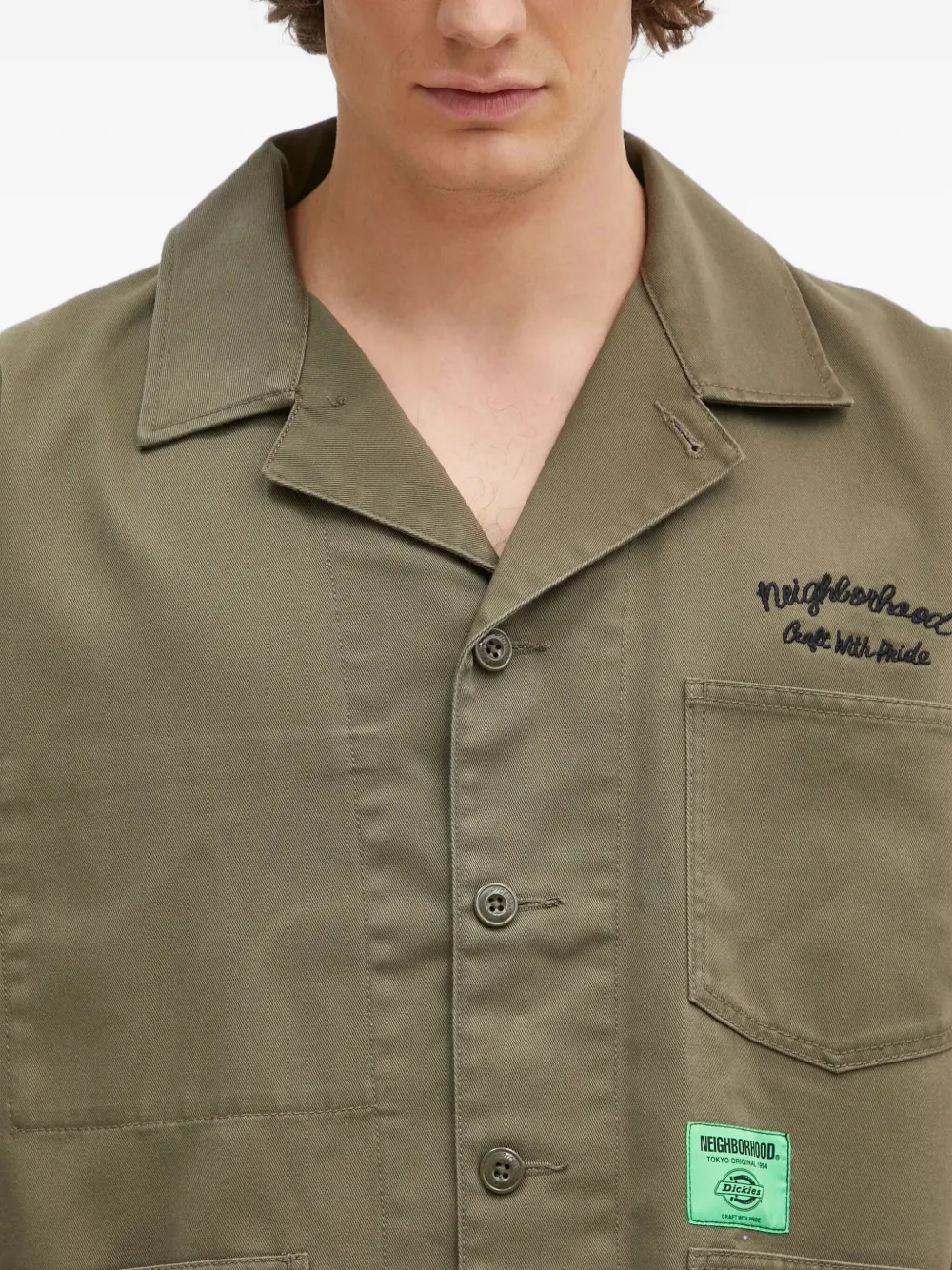 Neighborhood embroidered-logo patch-pocket jacket Groen