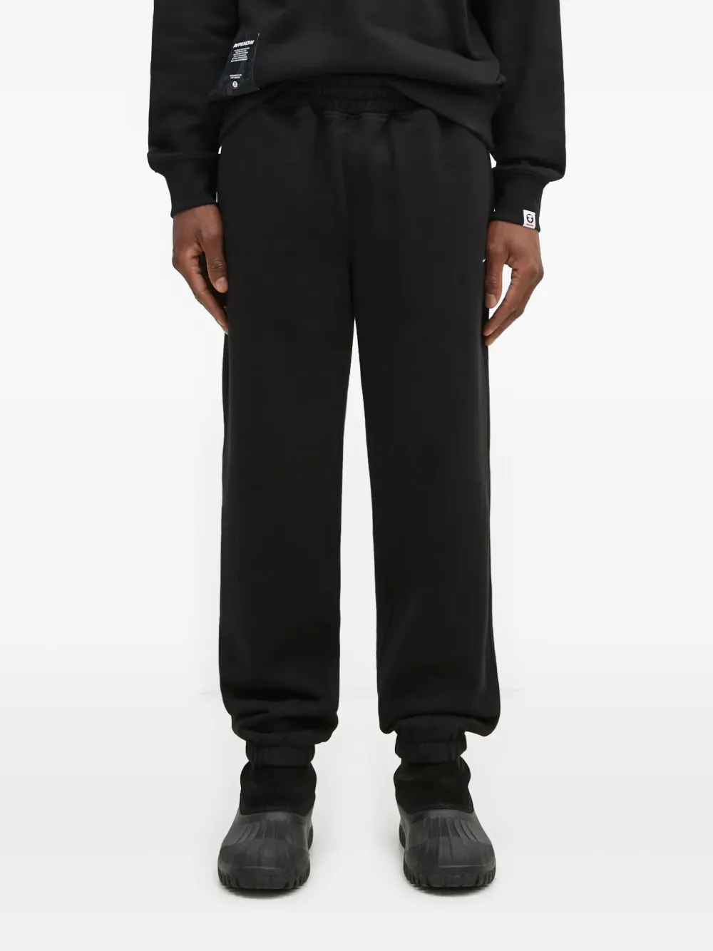 This Is Never That elasticated-ankle track pants - Nero