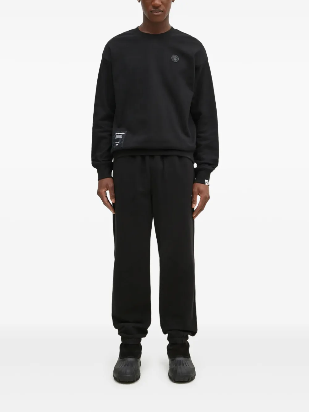This Is Never That elasticated-ankle track pants | Black | Image 1
