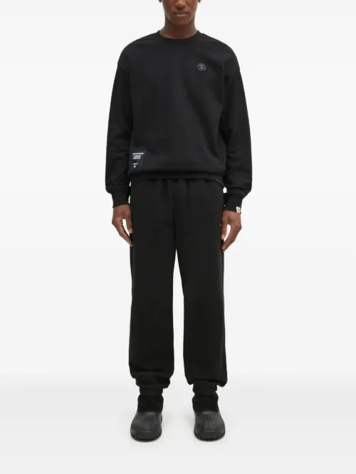 Pantalon de jogging à chevilles élastiquées - This Is Never That - Modalova