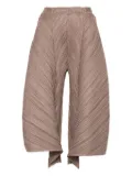 Pleats Please Issey Miyake Flare trousers - Brown