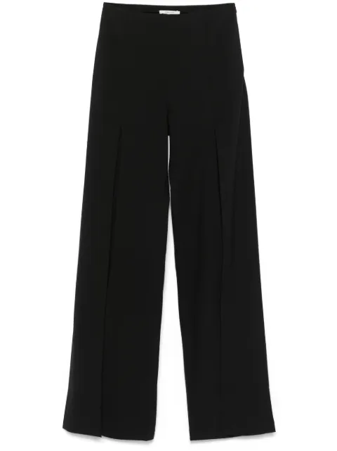 Nensi Dojaka pantalones con aberturas