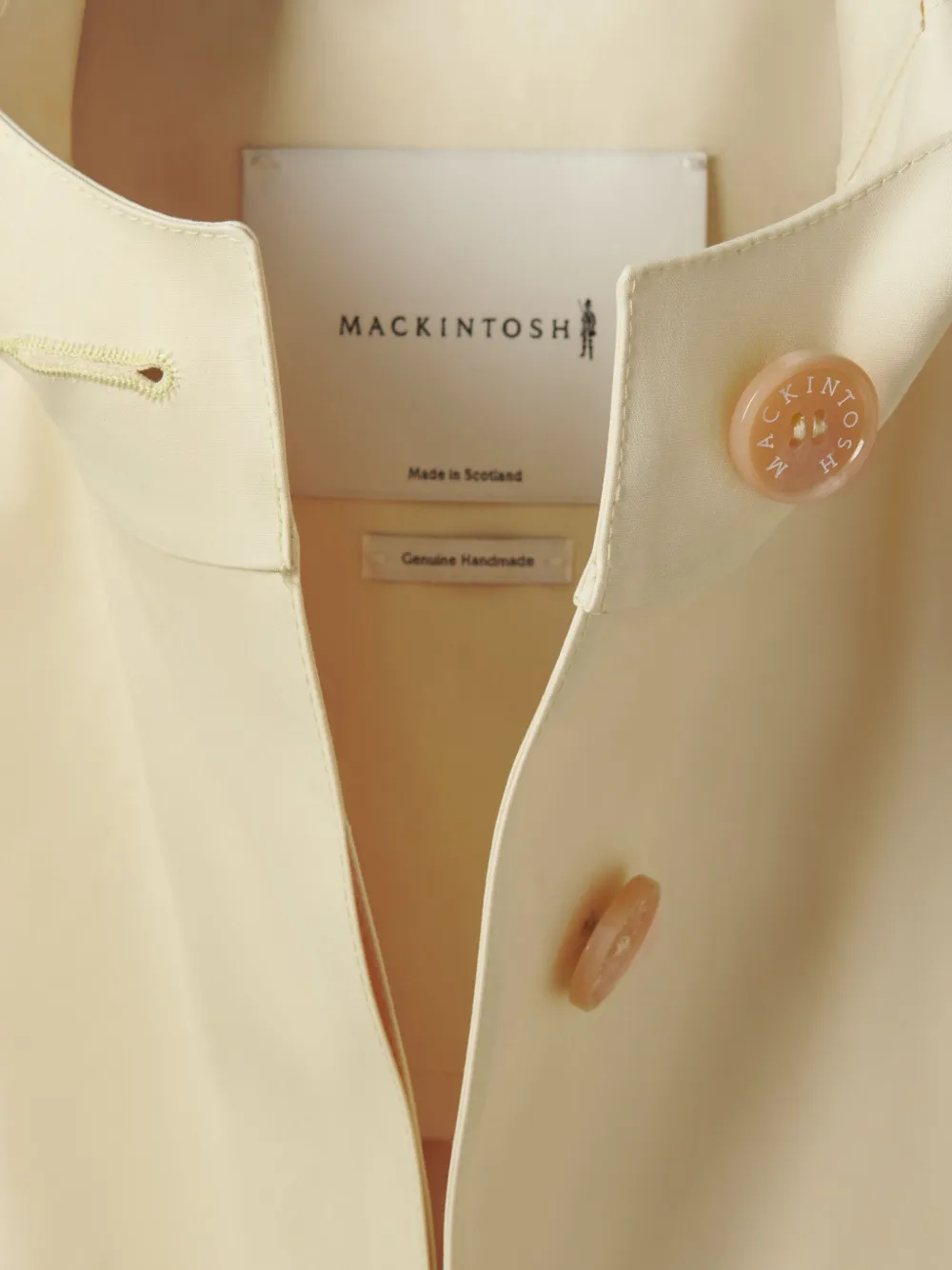 Mackintosh Jas met capuchon Geel