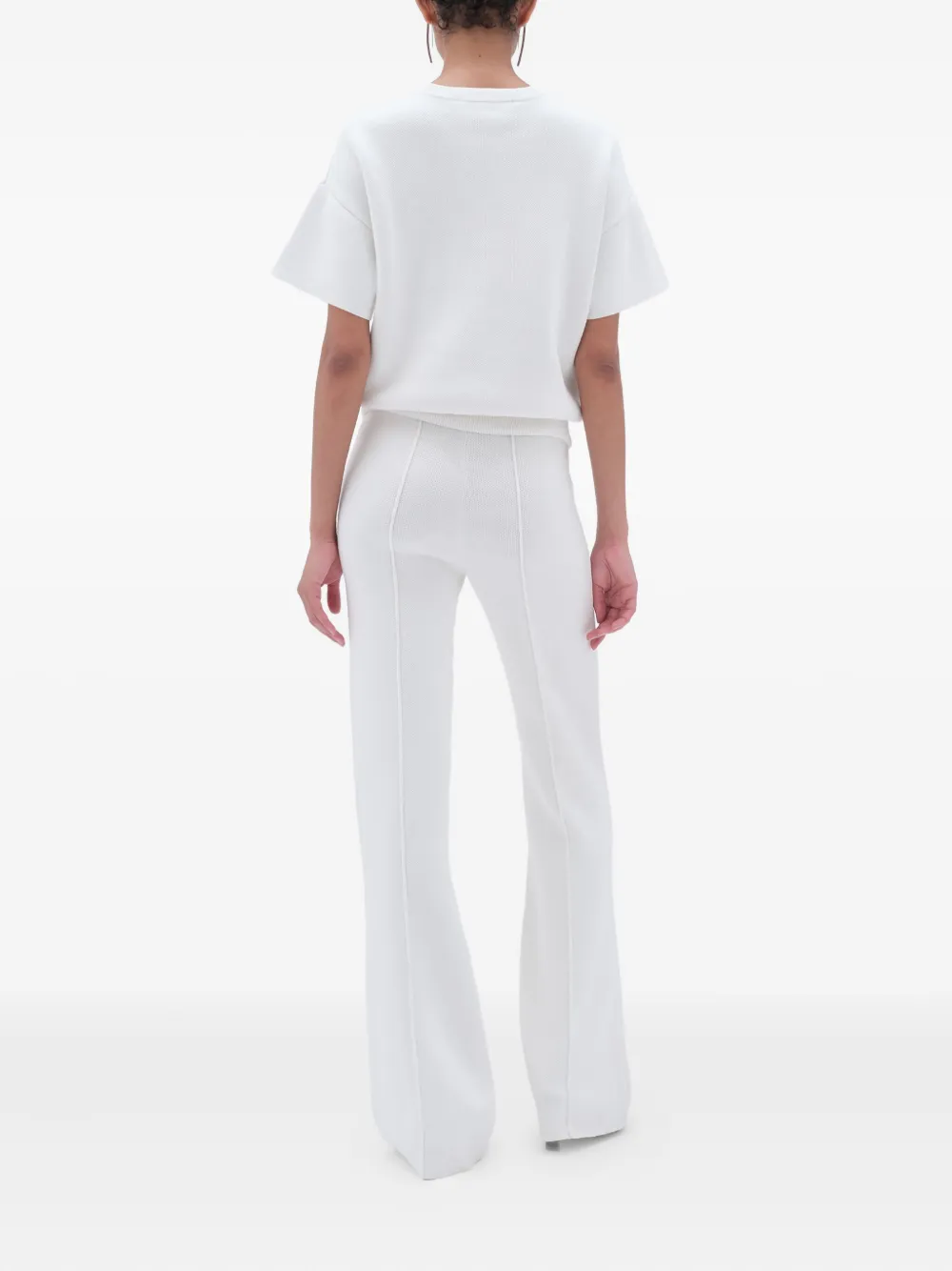 REMAIN Flared broek Wit