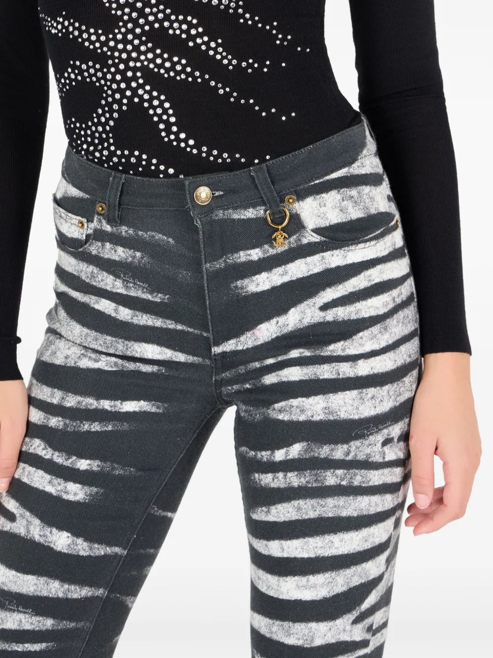 Shop Roberto Cavalli Zebra-print Flared Jeans In Black