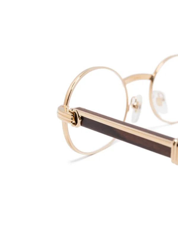 Cartier Eyewear オーバル眼鏡フレーム | ゴールドトーン Cartier Eyewear オーバル眼鏡フレーム | ゴールドトーン