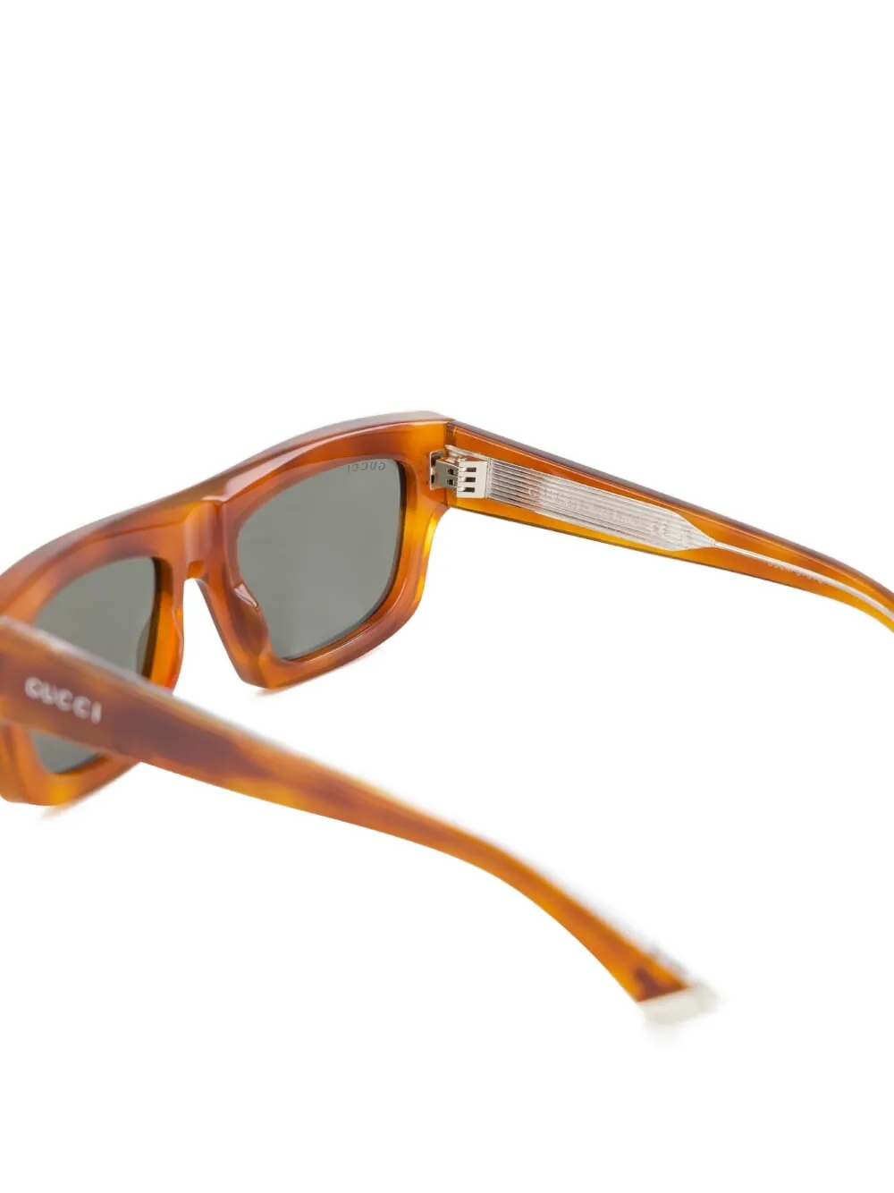 Gucci Eyewear Zonnebril met gegraveerd logo Bruin