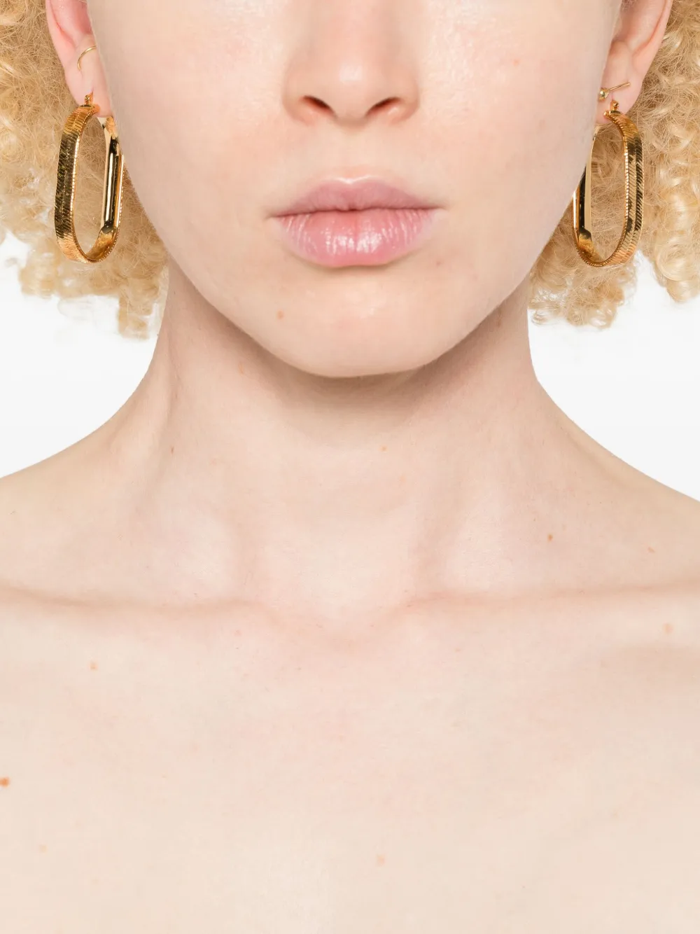 Jil Sander Ovalen oorbellen met visgraatpatroon - Goud