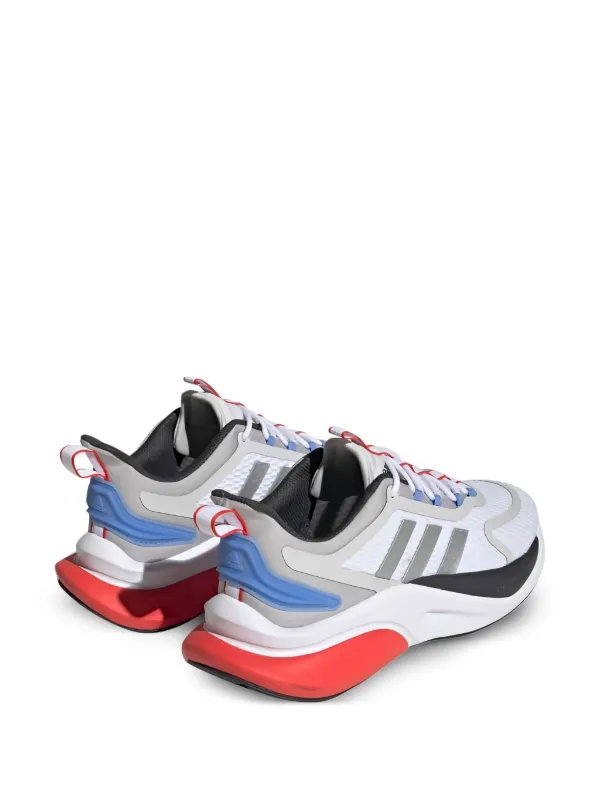 white adidas shoes with colorful bottoms