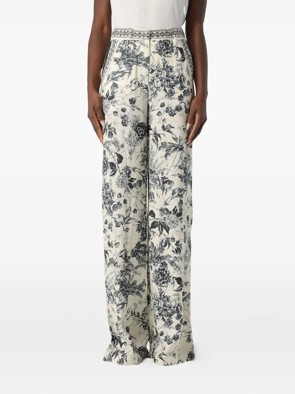 SIMONA CORSELLINI floral-print trousers | Neutrals | Image 1