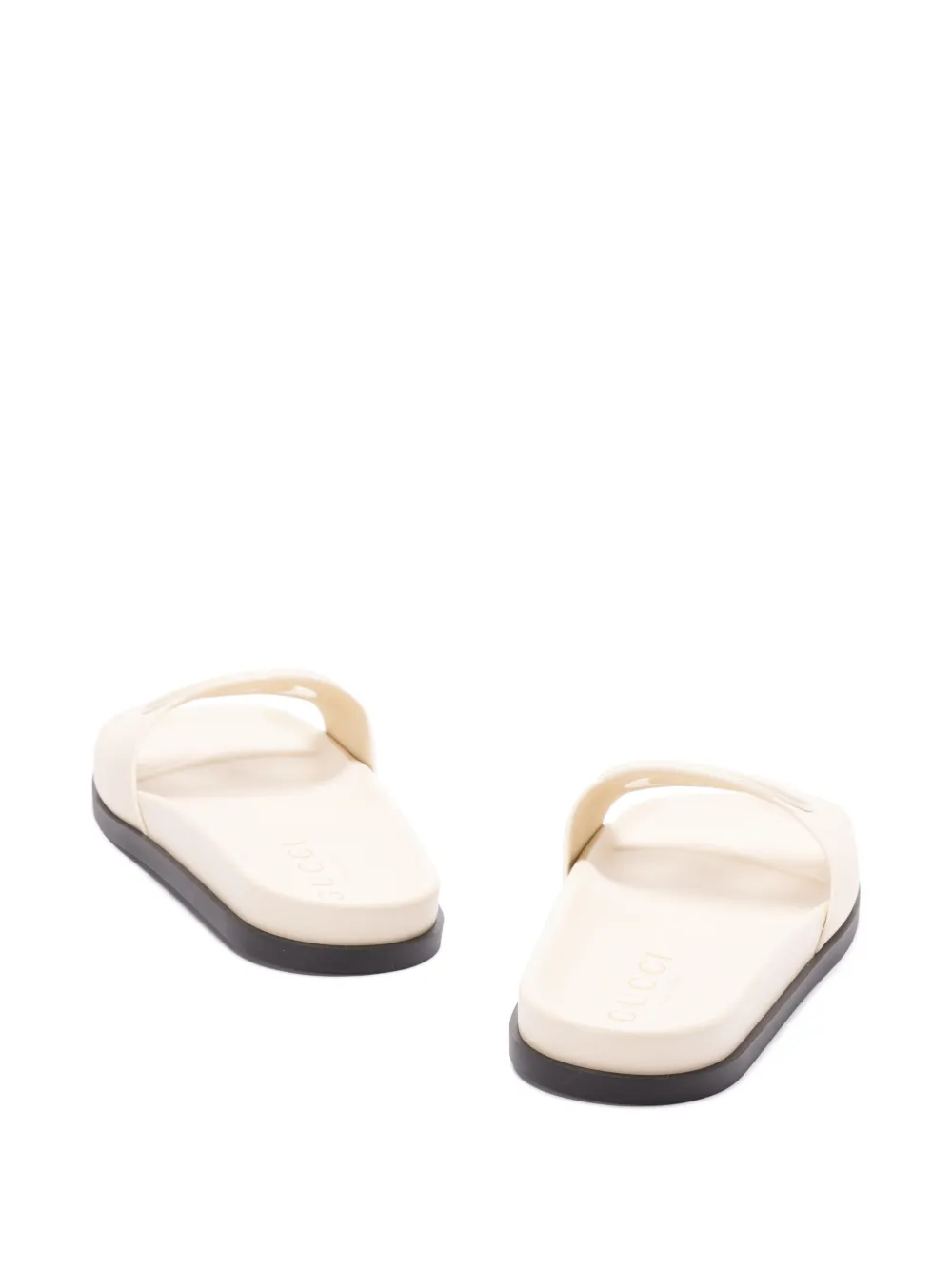 Gucci logo-embossed slides Neutrals