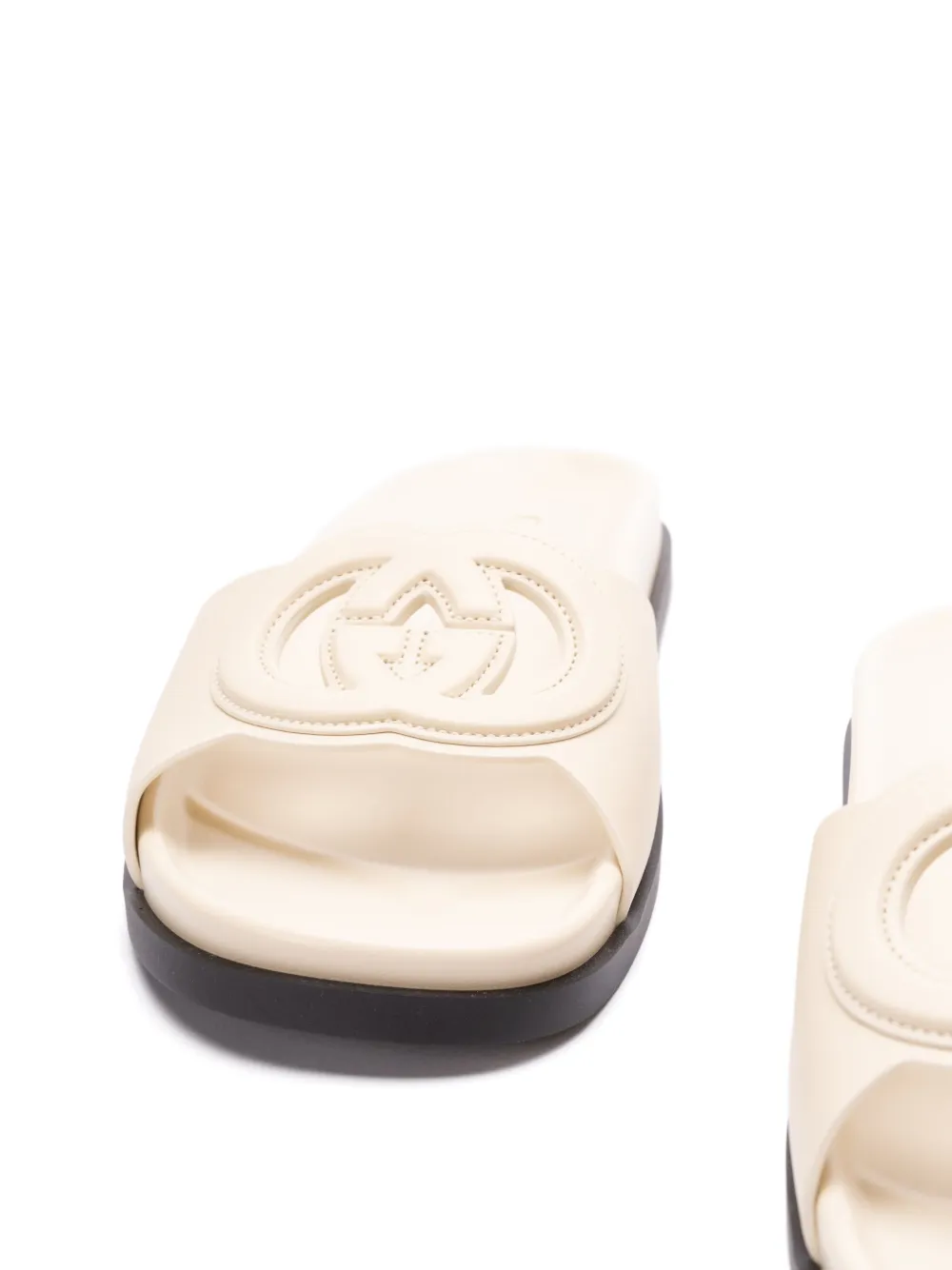 Gucci logo-embossed slides Neutrals