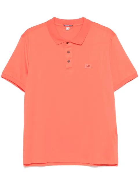 C.P. Company playera tipo polo con parche del logo