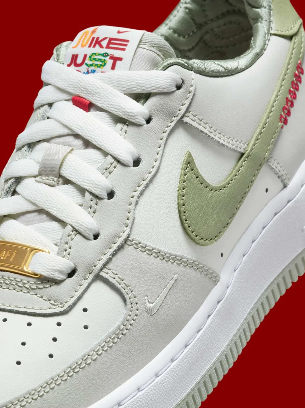Nike Kids Air Force 1 Low "Year of the Snake Sail White Light Bone Olive Aura" sneakers