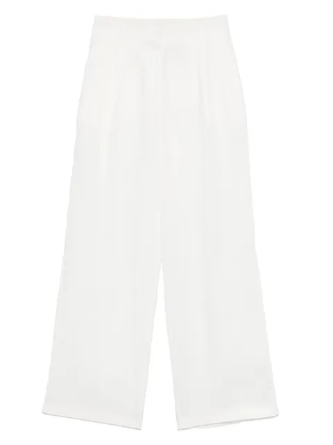Semicouture pantalones acampanados con bolsillos