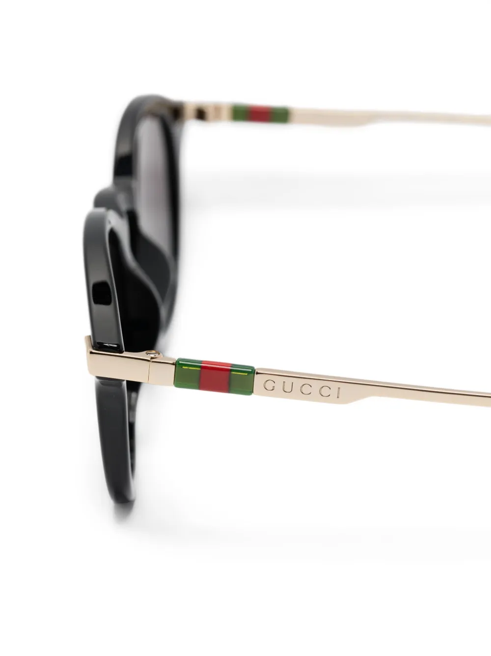 Gucci Eyewear Zonnebril met rond montuur Zwart