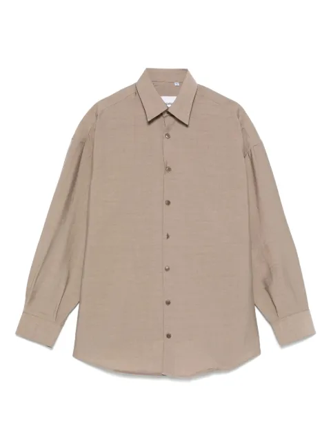 Costumein camisa con dobladillo redondeado