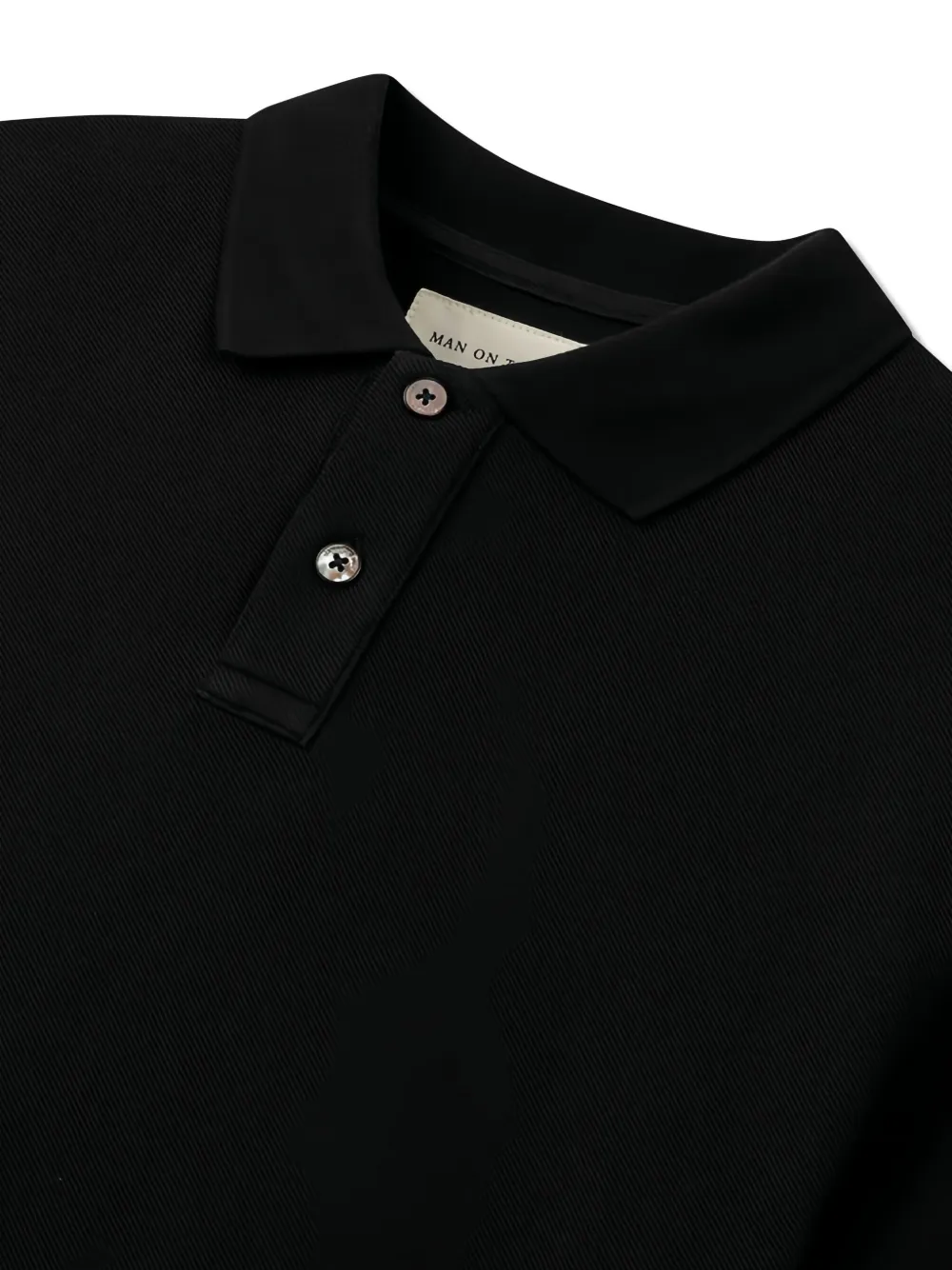 Man On The Boon. Piqué poloshirt Zwart
