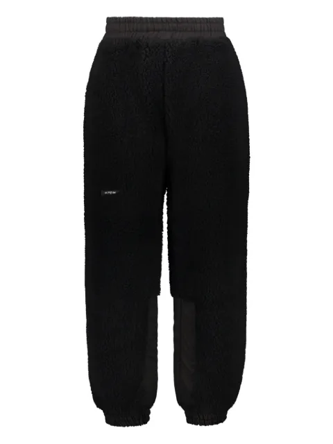 ISO.POETISM pants con parche del logo