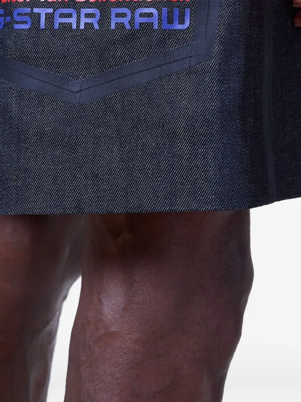 Walter Van Beirendonck Embossed Denim Shorts In Blue