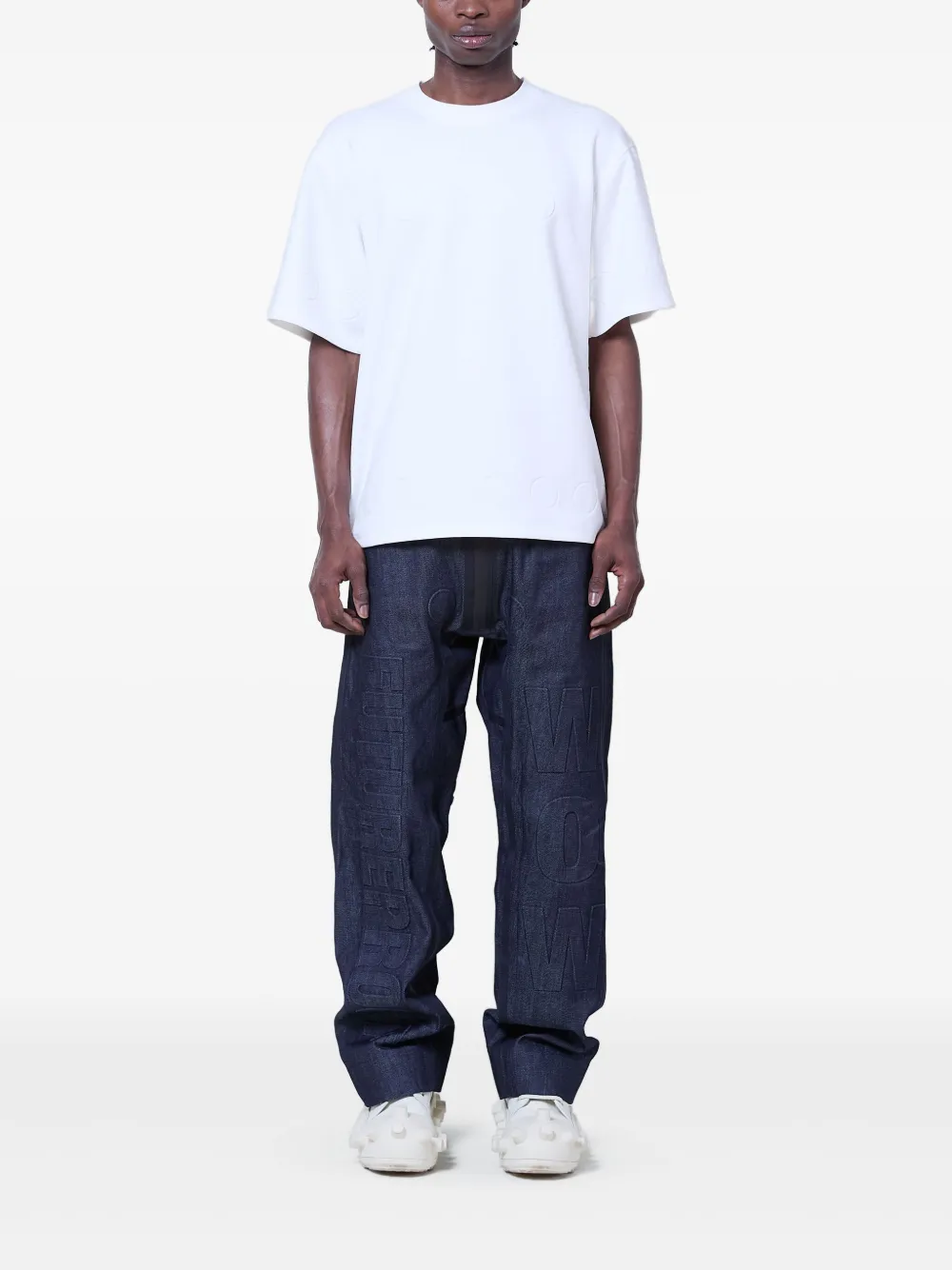 Walter Van Beirendonck Embossed Denim Jeans In Blau