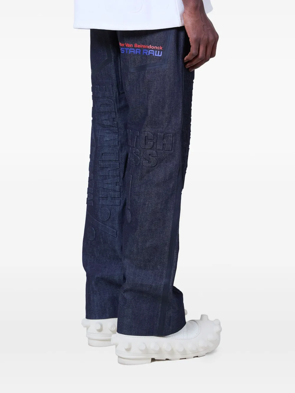 Walter Van Beirendonck Embossed Denim Jeans In Blau