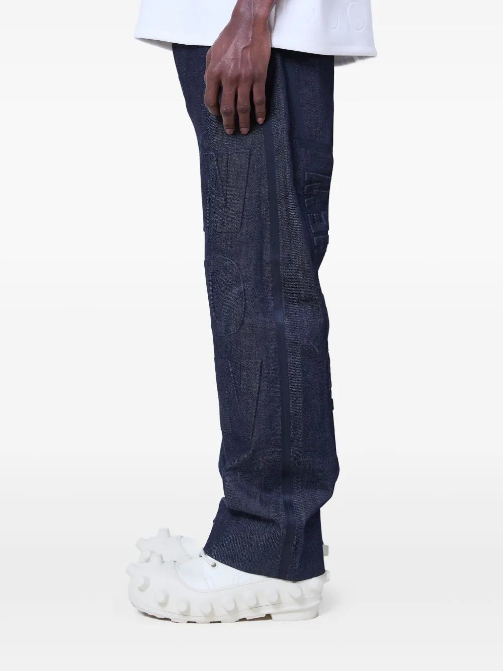 Walter Van Beirendonck Embossed Denim Jeans In Blau