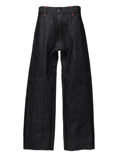Walter Van Beirendonck jeans con logo estampado