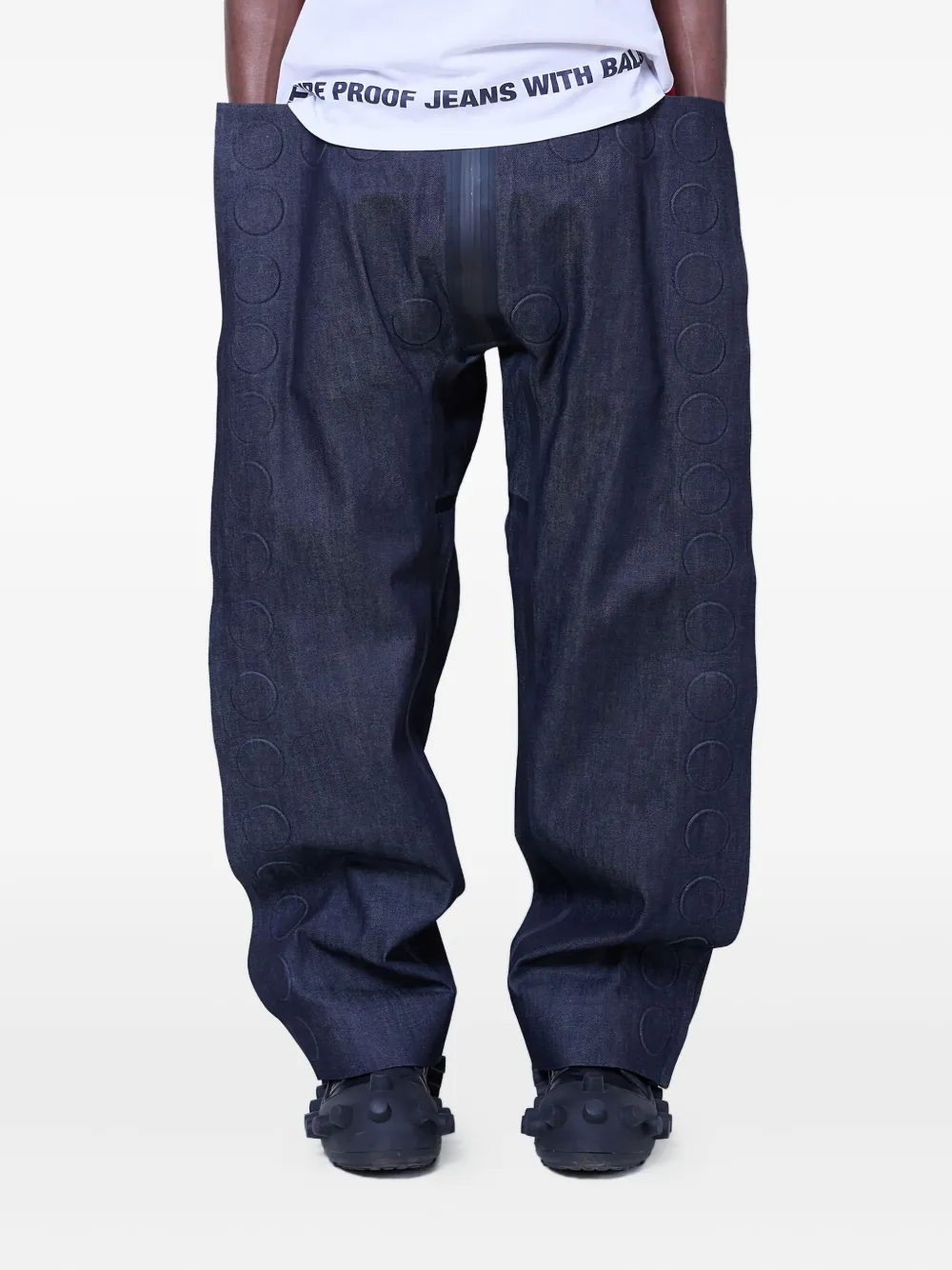 Walter Van Beirendonck embossed-detail jeans | Blue | Image 1