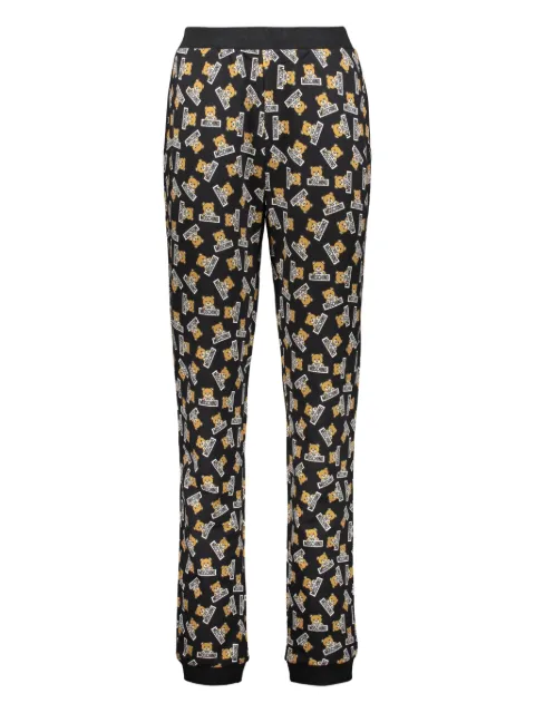 Moschino all-over print trousers