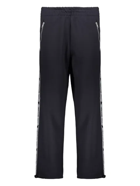 Moschino pantalones con rayas laterales
