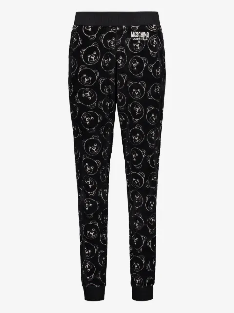 Moschino all-over print trousers