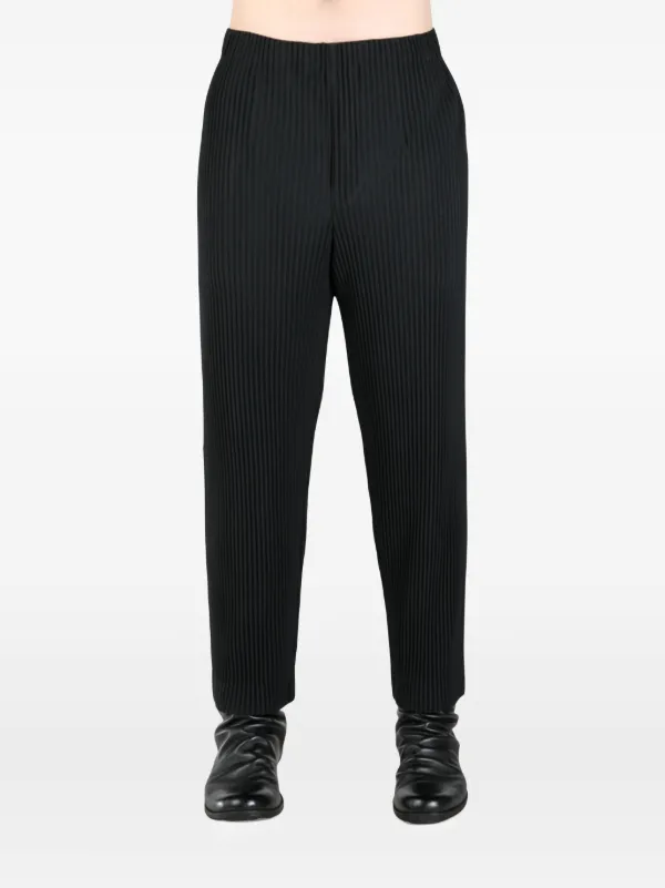 HOMME PLISSÉ ISSEY MIYAKE タキシードサルエルパンツ 黒 Homme Plisse Issey Miyake Pants in Black | FWRD