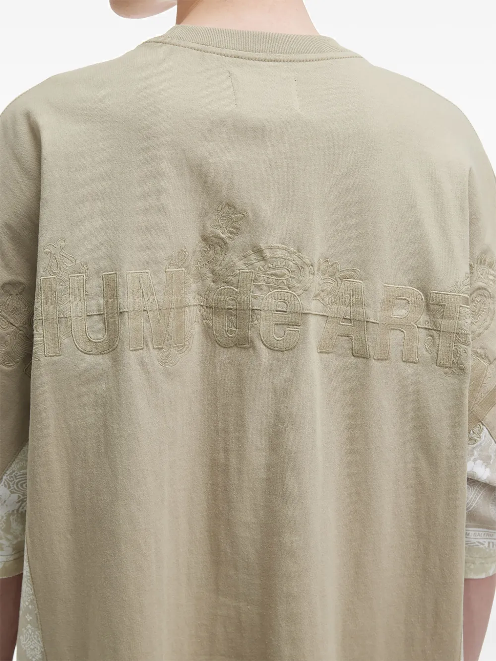 Musium Div. Ruimvallend T-shirt met zakdetail Beige